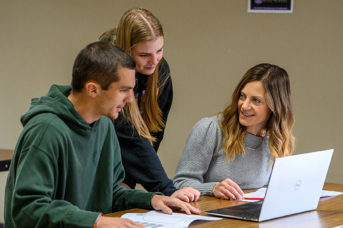 Group of students taking by laptop