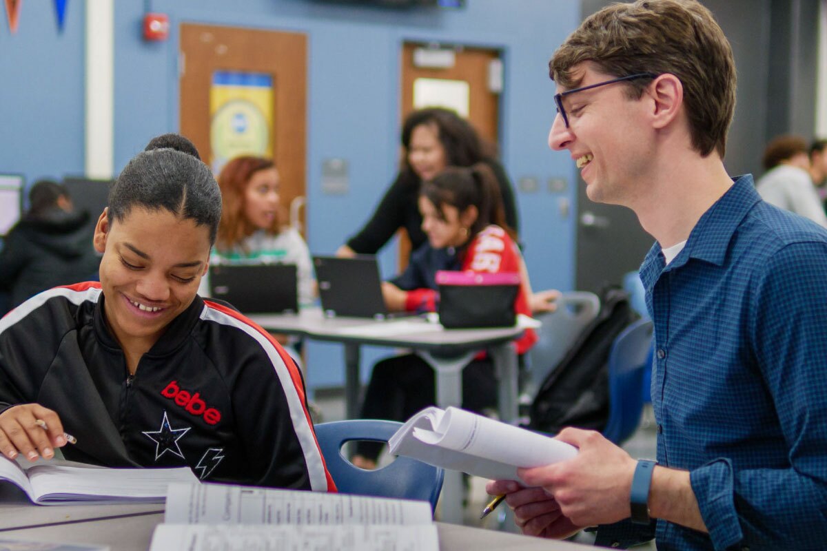 Student talking with coach